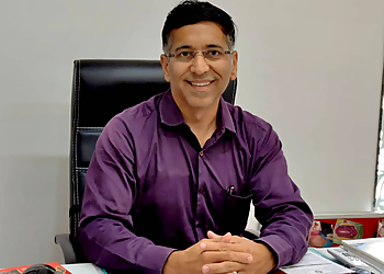 Dr. Anup S. Kela, MBBS, MS, MCH - EKLAVYA HOSPITAL