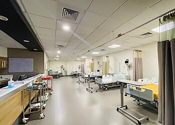 Dr. Dilip Panikar, MBBS, MS, M.CH - ASTER MEDCITY