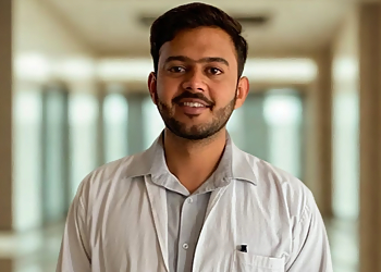 Dr. Emad Ansari, MBBS, MS, FIJR, FISM, FIFA