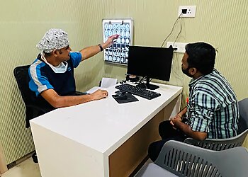 Dr. Eshan Nerkar, MBBS, MS, MCh - AXON BRAIN AND SPINE CLINIC