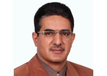 Dr. Farooq Ahmad Bhat, MBBS, MS, MCh, FRCS