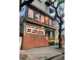 Dr. Girish A.C, MBBS, MS, M.Ch - CURLS & CURVES COSMETIC SURGERY CENTRE