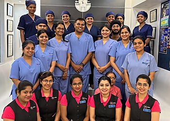 Dr. Milind Darda, MDS - 32 SMILES DENTAL CLINIC