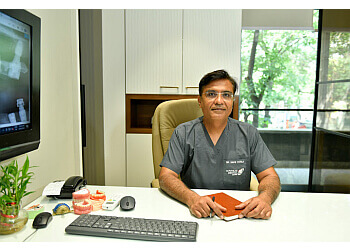 Dr. Navin Futela BDS, MDS - Dr. Futela's Dental Centre