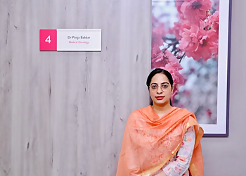 Dr. Pooja Babbar, MBBS, MD, SR, DM