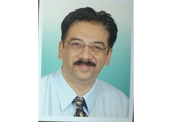 Dr. Suresh M Dugani, MBBS, MCH, FIAMS - Shivkrupa Hospital