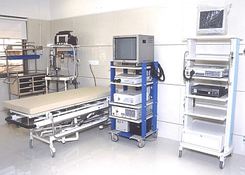 Dr. Suresh Zinzuvadia, MBBS, MD, DM - GASTRO CARE HOSPITAL