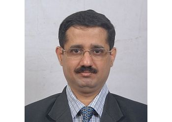 Dr. Tushar Sahasrabudhe  MBBS, MD, DETRD, FCCP (USA)