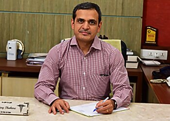 Dr. Vijay Thakore, MBBS, MS, PDCC - AADICURA SUPERSPECIALITY HOSPITAL