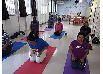 Pure Fitness Studio power yoga classes