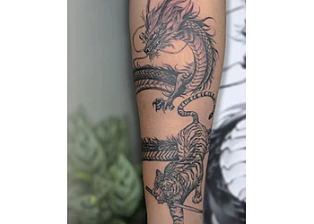 RJ Tattoo & Piercing Studio