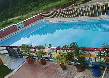 Dehradun Swimming Pools River Bank swimming Pool and Restaurant image 1