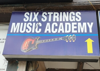 Six strings music academy