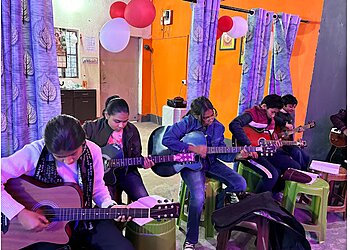 The Six Strings Guitar Academy